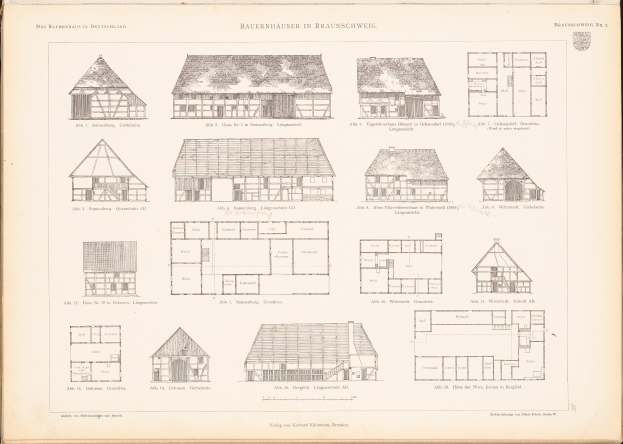 Ein offenes altes Buch mit Architekturhausplänen