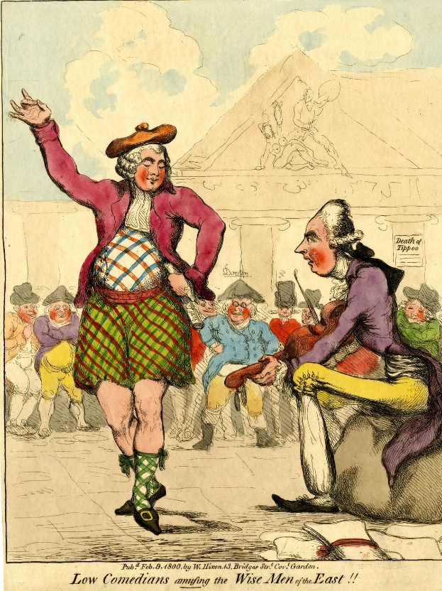 Cartoon of a man in a kilt and a woman in a dress standing in front of a crowd, with a building and clouds in the background, and text at the bottom reading 'Low Comedians Amusing the Wise Men of the East'.