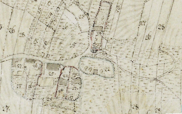 Detailierte alte Stadtkarte mit nummerierten Gebäuden, Straßen und Text, markiert für eine vorgeschlagene Entwicklung unten.
